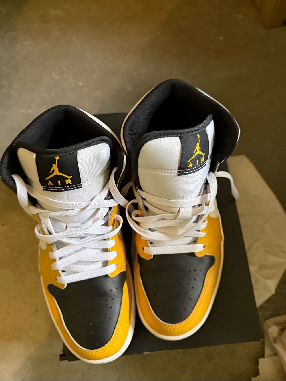Air Jordan 1 Mid in the classic Black/White/Gold colorway. Men’s size 8